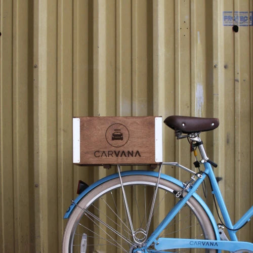 Rear half of Columbia Blue Willow 3 with "Carvana" decal and "Carvana" branded wooden crate